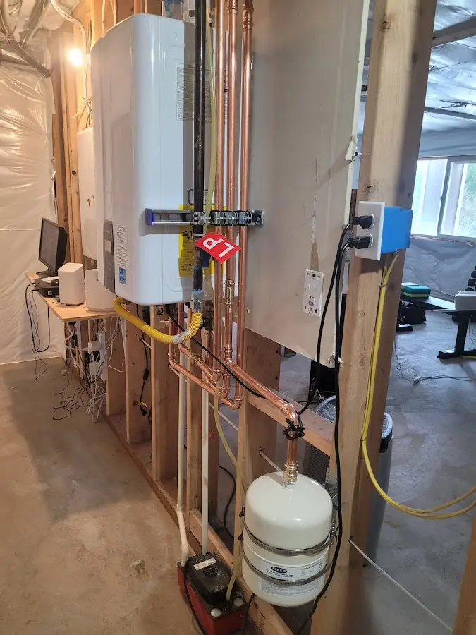 Licensed plumber repairing a kitchen sink in Norway
